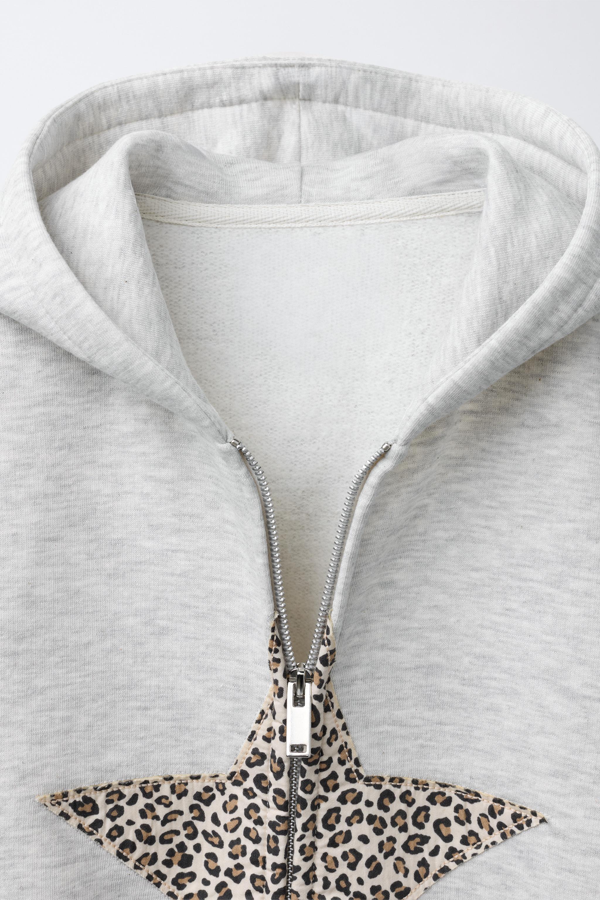 ZIP-UP ANIMAL PRINT STAR SWEATSHIRT